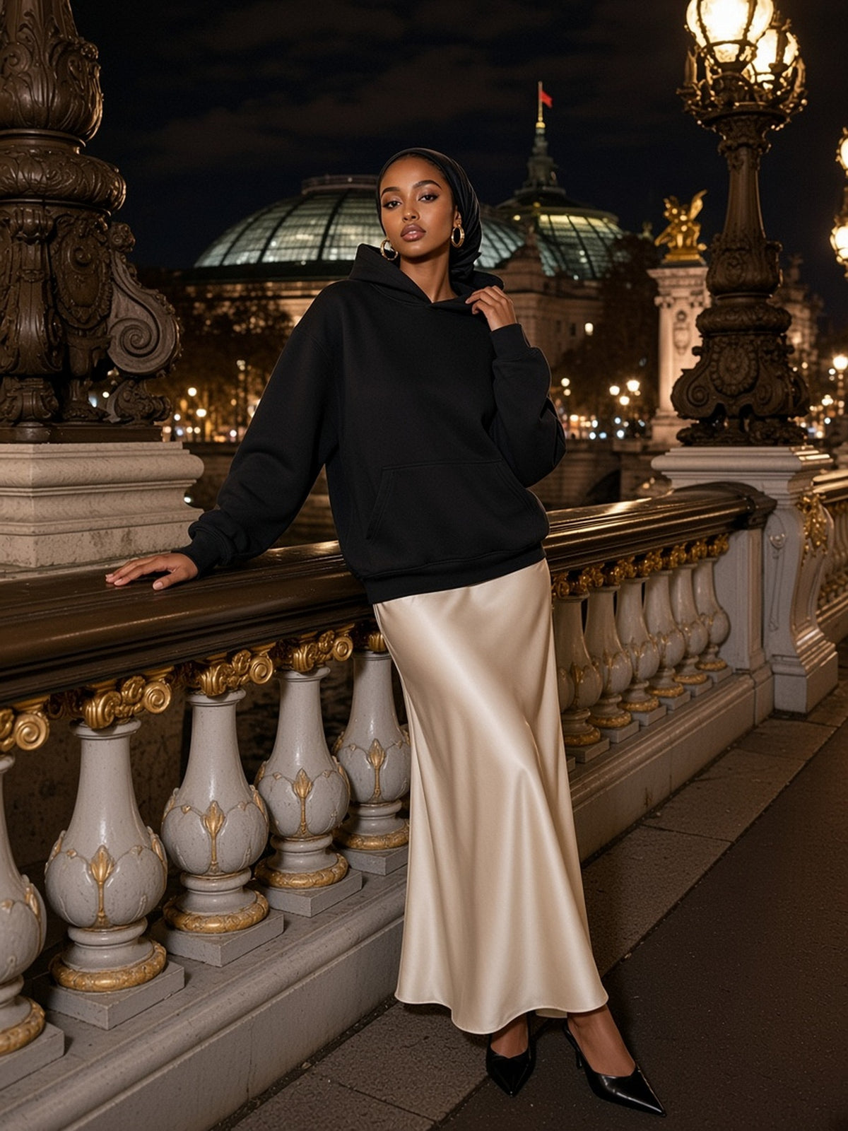 Woman in Marcel Afters Drop Shoulder Hoodie in Black, model front