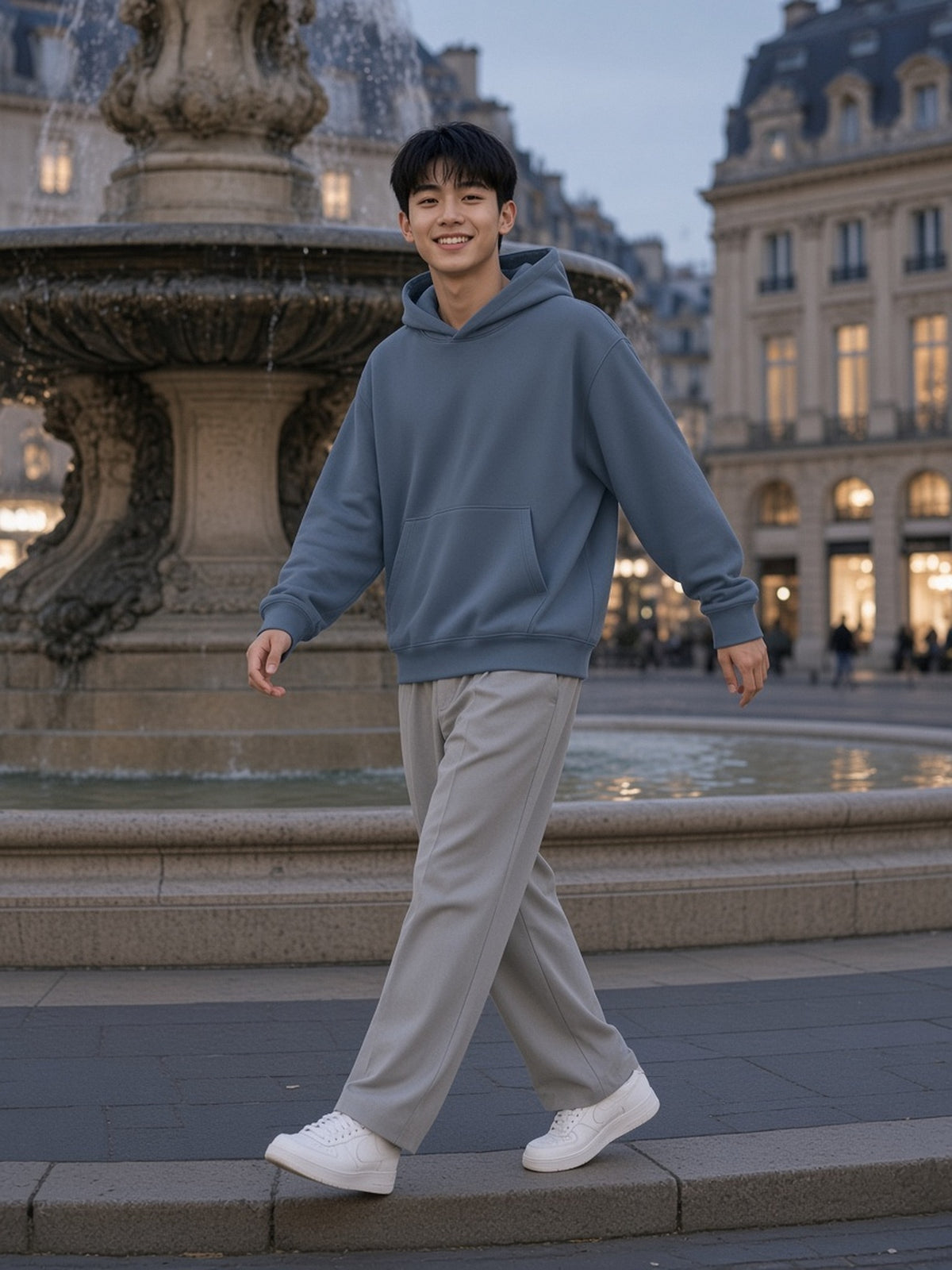 Man in the Oversized Drop Shoulder Hoodie in Blue, model front