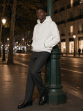 Man in the Relaxed Fit Hoodie in White, model front