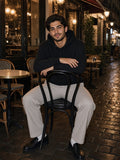 Man in the Relaxed Fit Hoodie in Black, model front