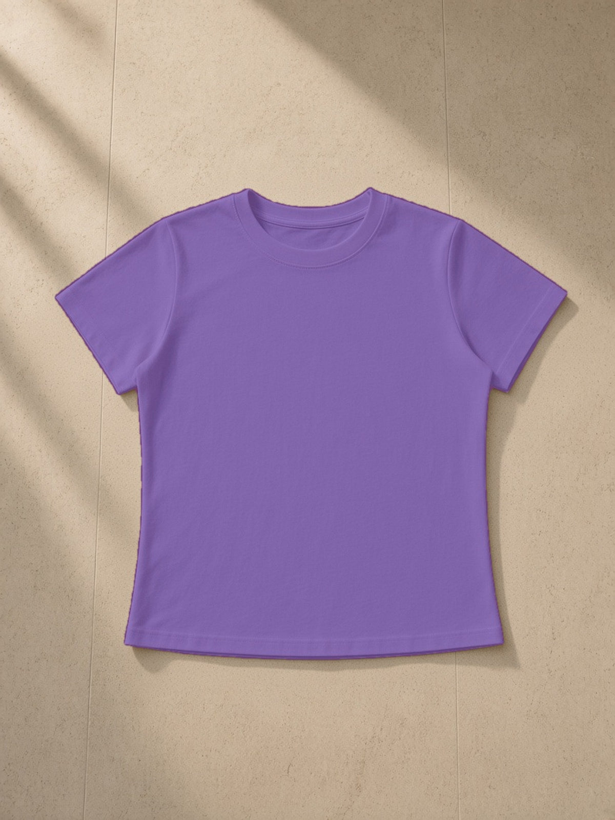 Vintage wash slim fit t-shirt in Purple, laid flat on pale limestone, front view