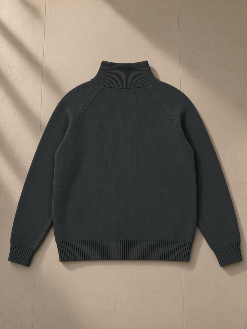 Quarter-zip pullover sweatshirt in Dark Gray on a hanger in a Carlyle-style New York suite at night
