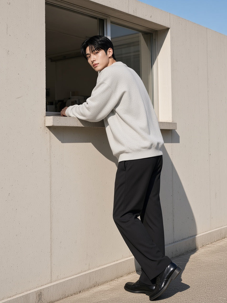 Man in the Boxy Fleece Crewneck Sweatshirt in Flower Gray walking past a gallery in Hannam-dong, Seoul in the morning