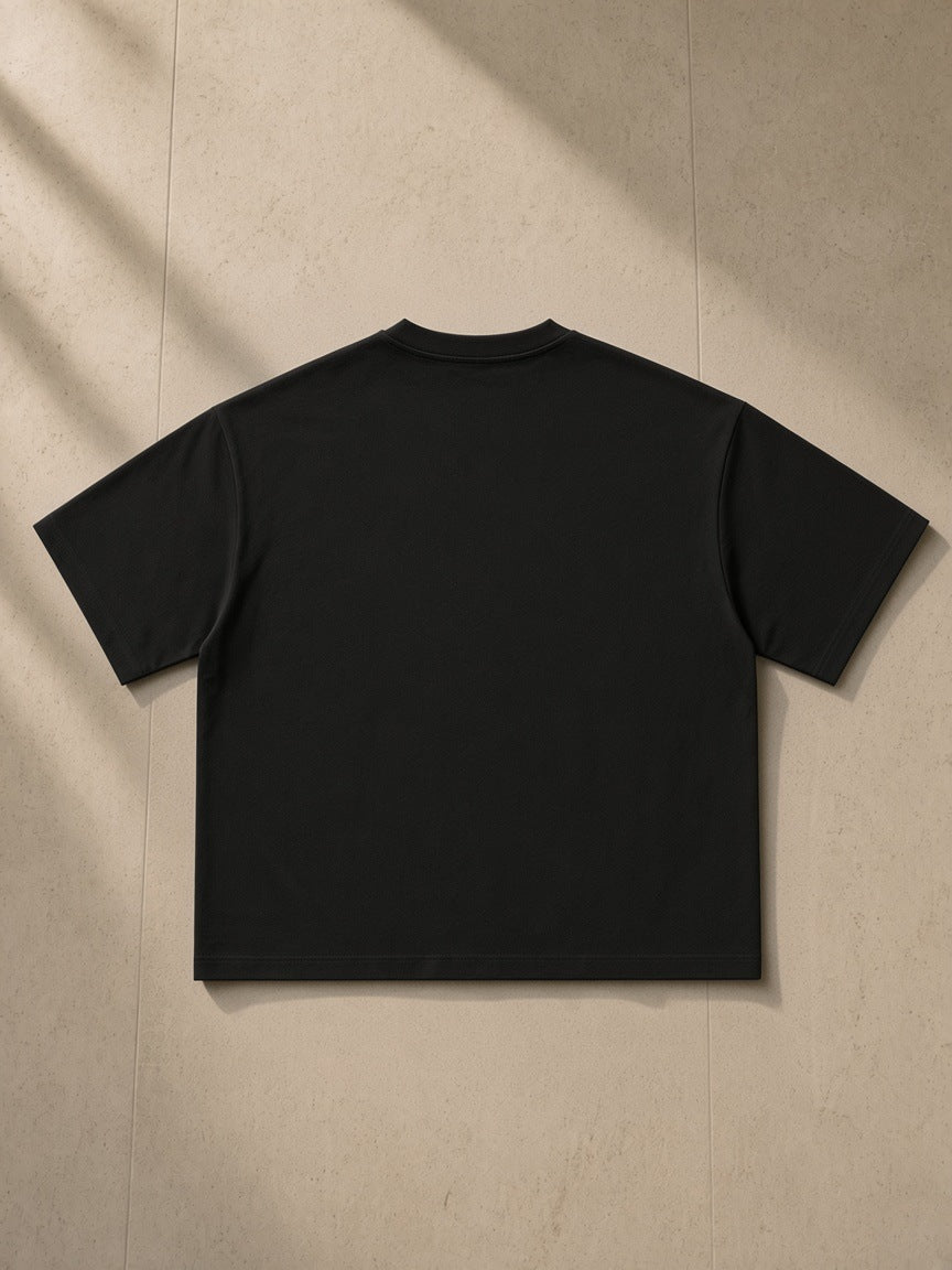 Back of the Black Women's Boxy Oversized T-Shirt, laid flat