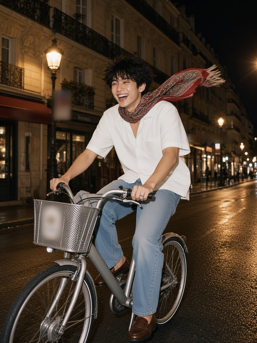 Man in the Boxy Short Sleeve Shirt in White walking a Haussmann street in Paris by day