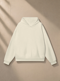 Heavyweight Hidden Pocket Fleece Hoodie in Bone, laid flat on pale limestone, front.