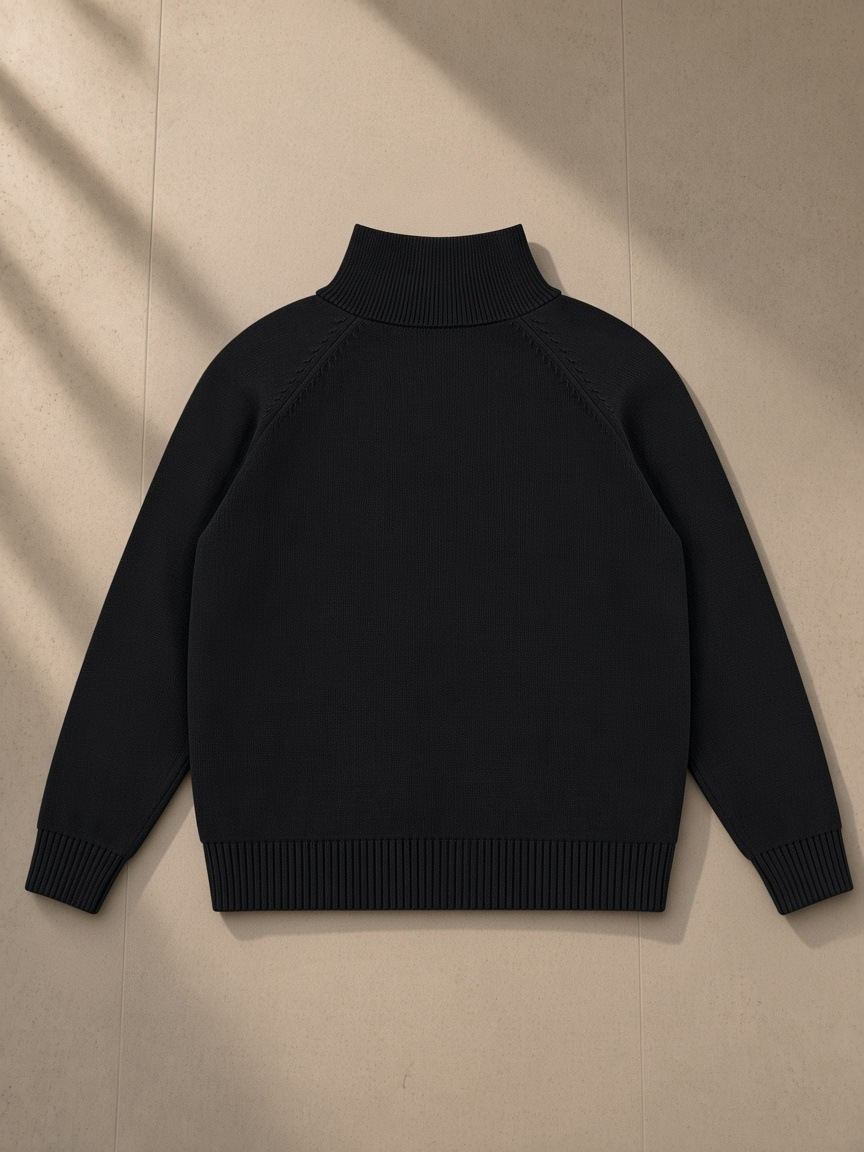 Quarter-zip pullover sweatshirt in Black on a wooden hanger in a Kyoto ryokan at night