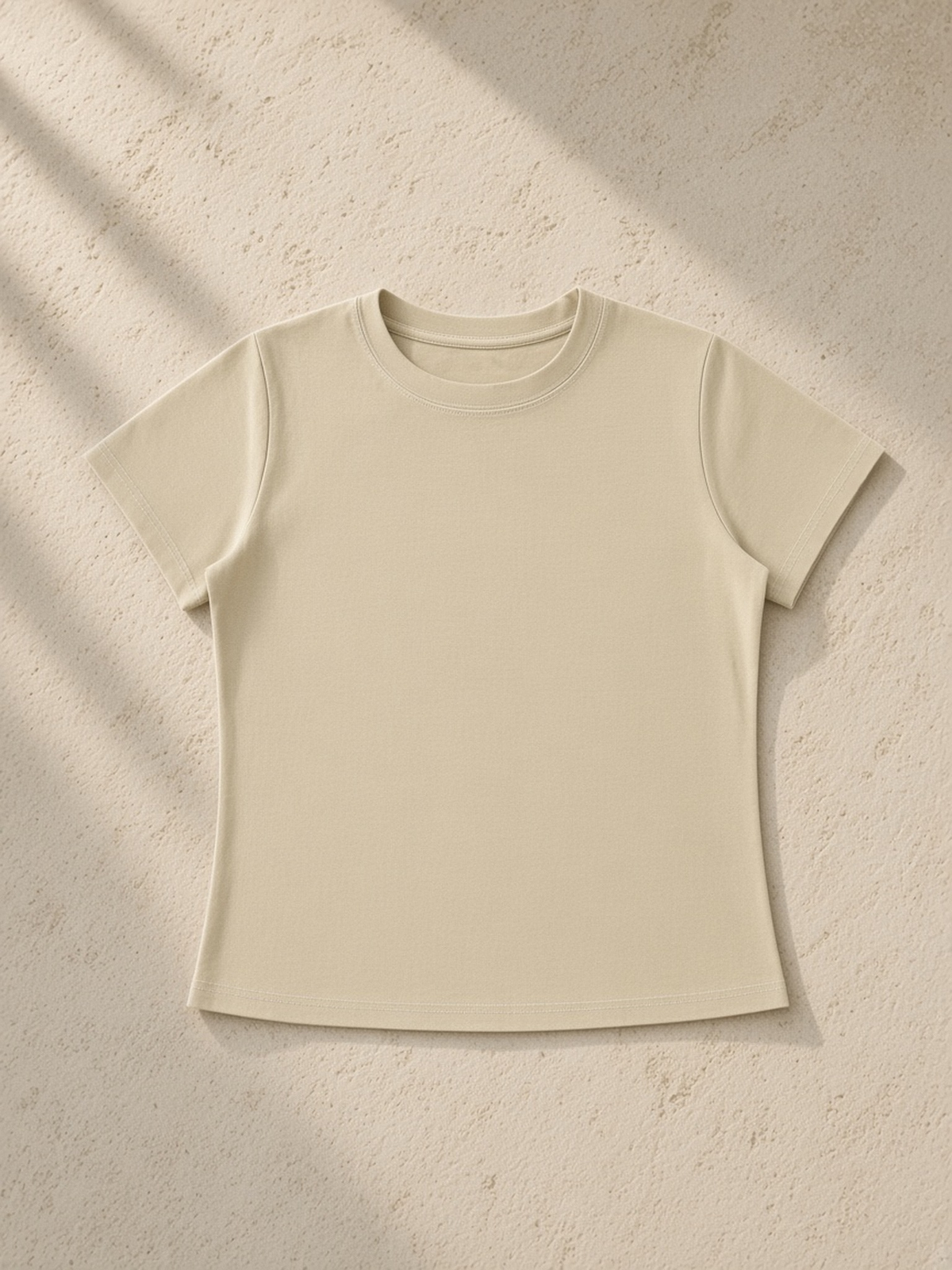 Vintage Wash Slim Fit T-shirt in Khaki, laid flat on pale limestone, front.