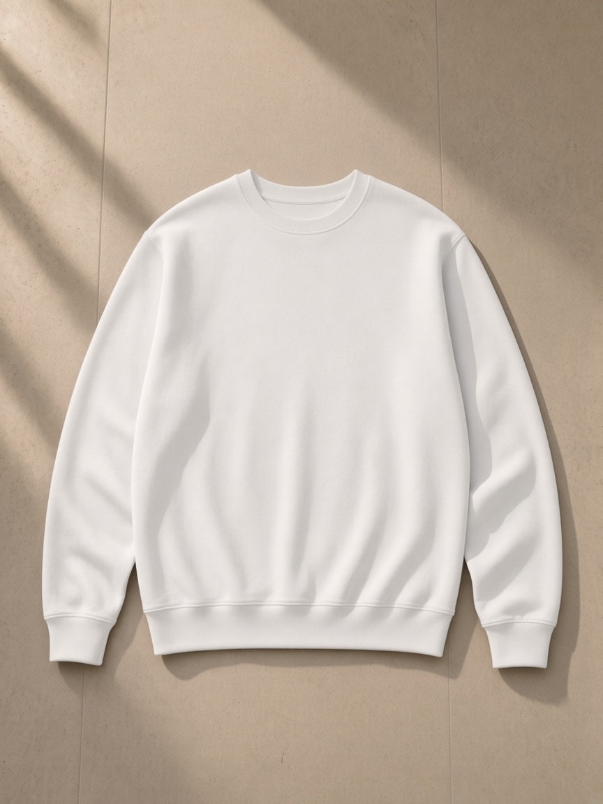 Classic Cotton Sweatshirt in Lucent White, laid flat on pale limestone, front view