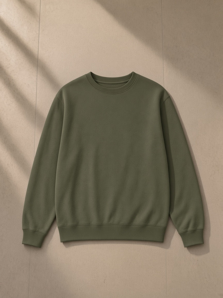 Classic Cotton Sweatshirt in Olive Green, laid flat on pale limestone, front view