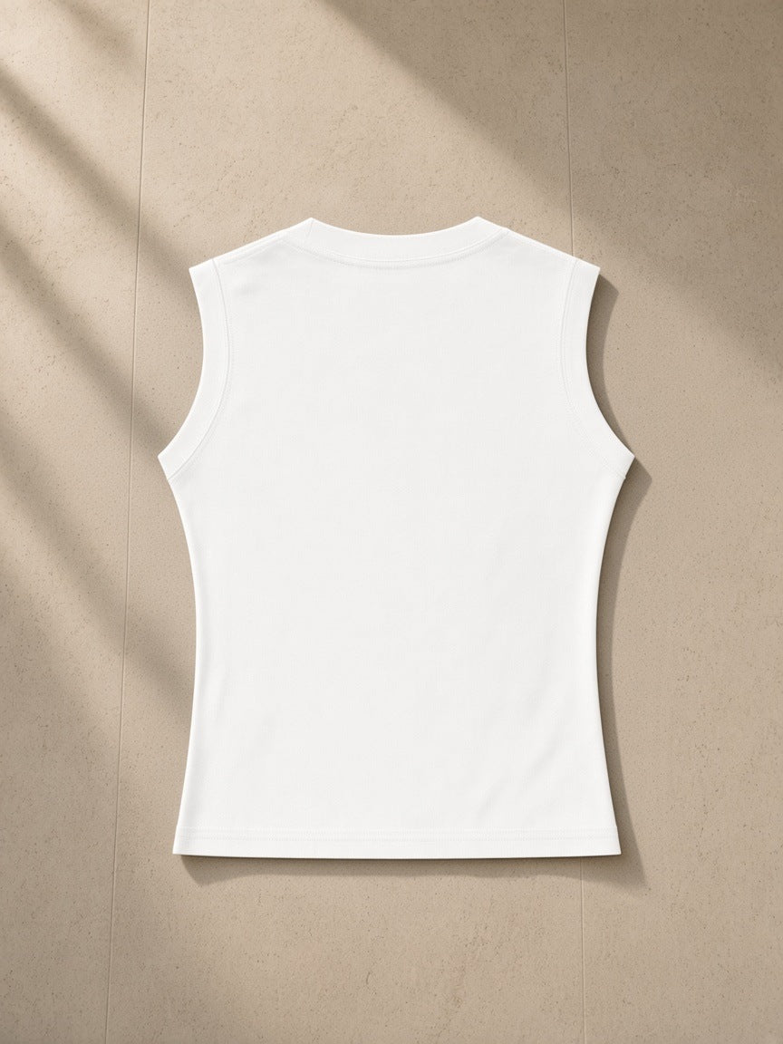 Women's Crewneck Tank Top in White, laid flat on pale limestone, back view