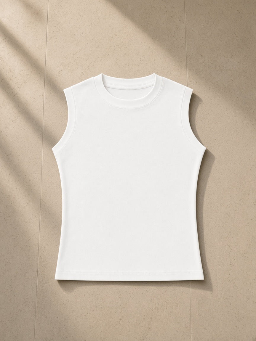 Women's Crewneck Tank Top in White, laid flat on pale limestone
