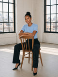Woman in the Pure Cotton T-Shirt in Sky Blue in a Tribeca loft in New York in the morning