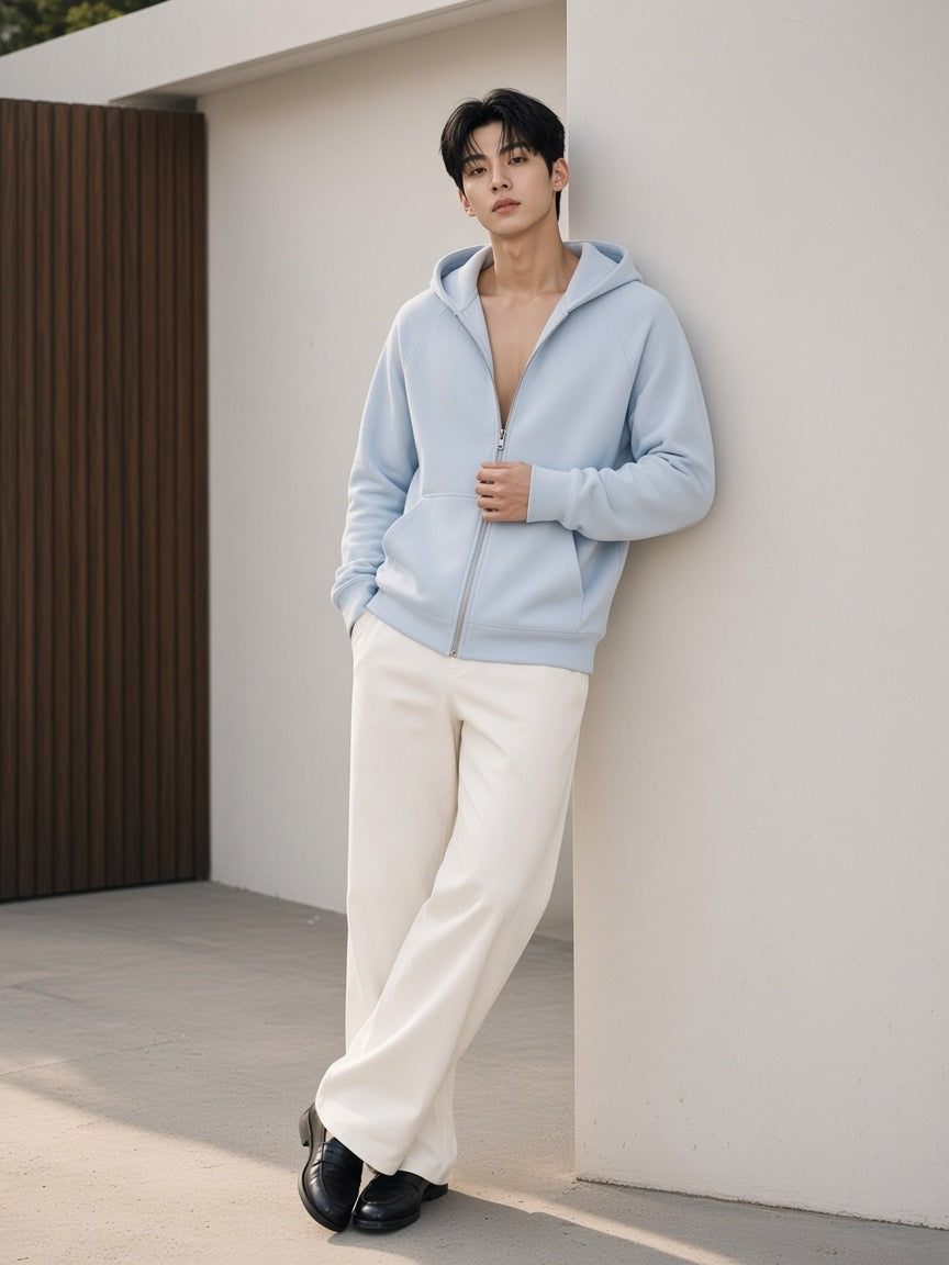 Man in the Raglan Full Zip Hoodie in Light Blue on a gallery street in Seoul by day