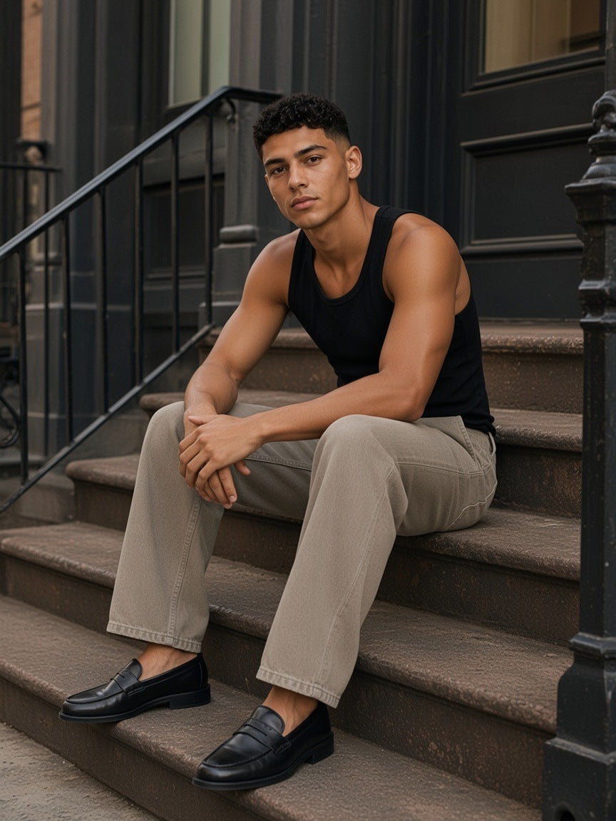 Man in the Snow Washed Straight Leg Pants in Stone Gray on a SoHo street in New York by day