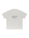 Jackson Hole Heavyweight Drop Shoulder T-Shirt by Marcel Afters in Oat Gray, front view with the printed artwork, on white