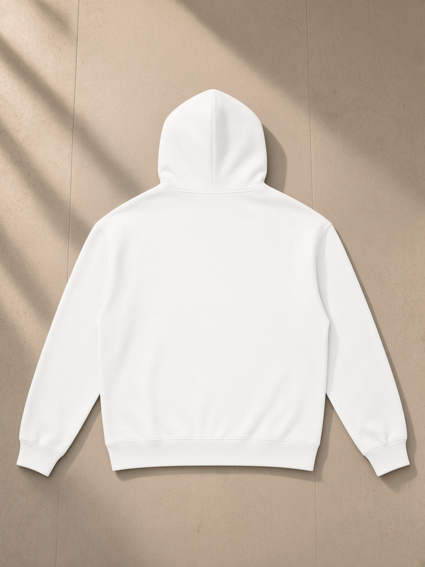 Men's heavyweight full-zip hoodie in White, laid flat on pale limestone, back view