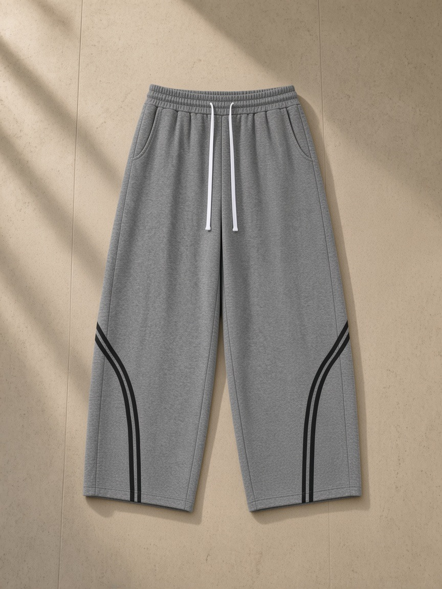 Wide Leg Piping Sweatpants in Flower Gray, laid flat on pale limestone