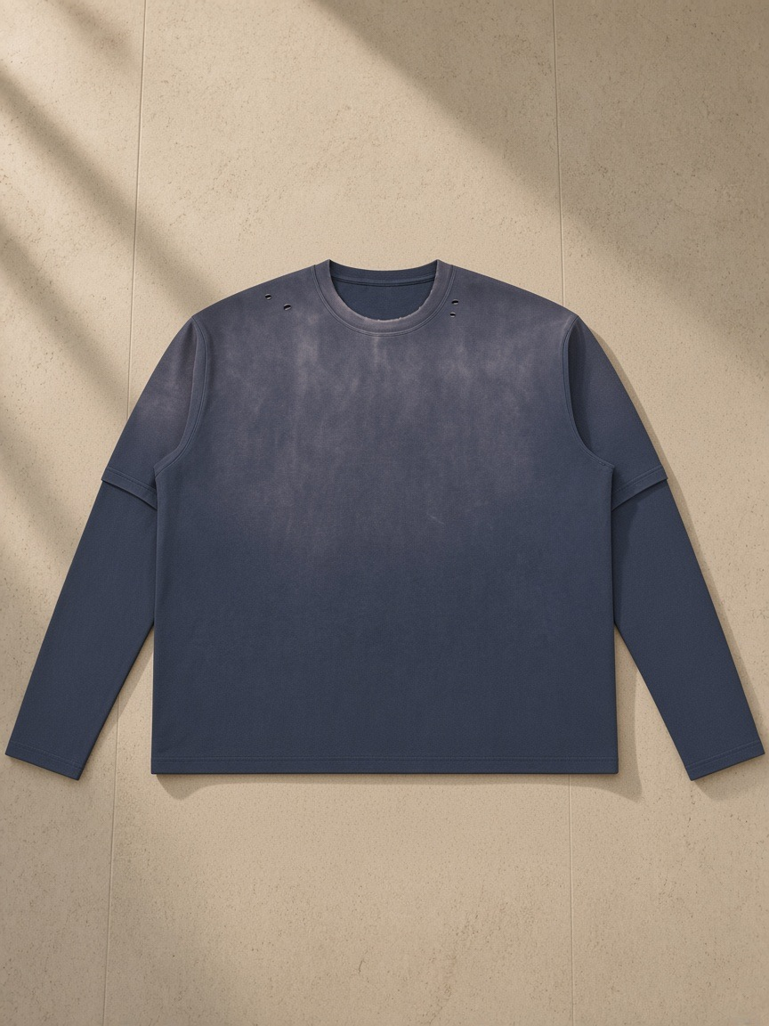Vintage Wash Layered T-Shirt in Navy Blue, laid flat on pale limestone