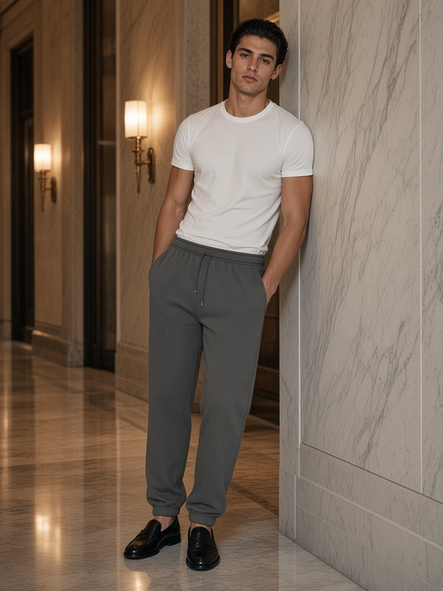 Essential Fleece Sweatpants in Carbon Gray, à deux, worn by him