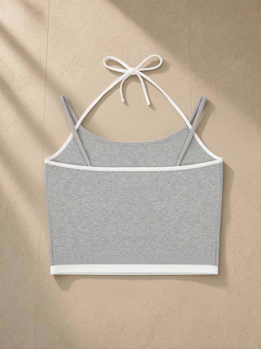 Women's Contrast Binding Halter Top in Flower Gray, laid flat on pale limestone, back view