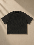 Unisex textured waffle washed boxy t-shirt in Black, front view on white. Marcel Afters