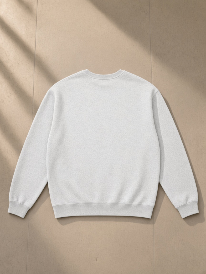 Loose Crewneck Sweatshirt in Flower Gray, laid flat on pale limestone, front.