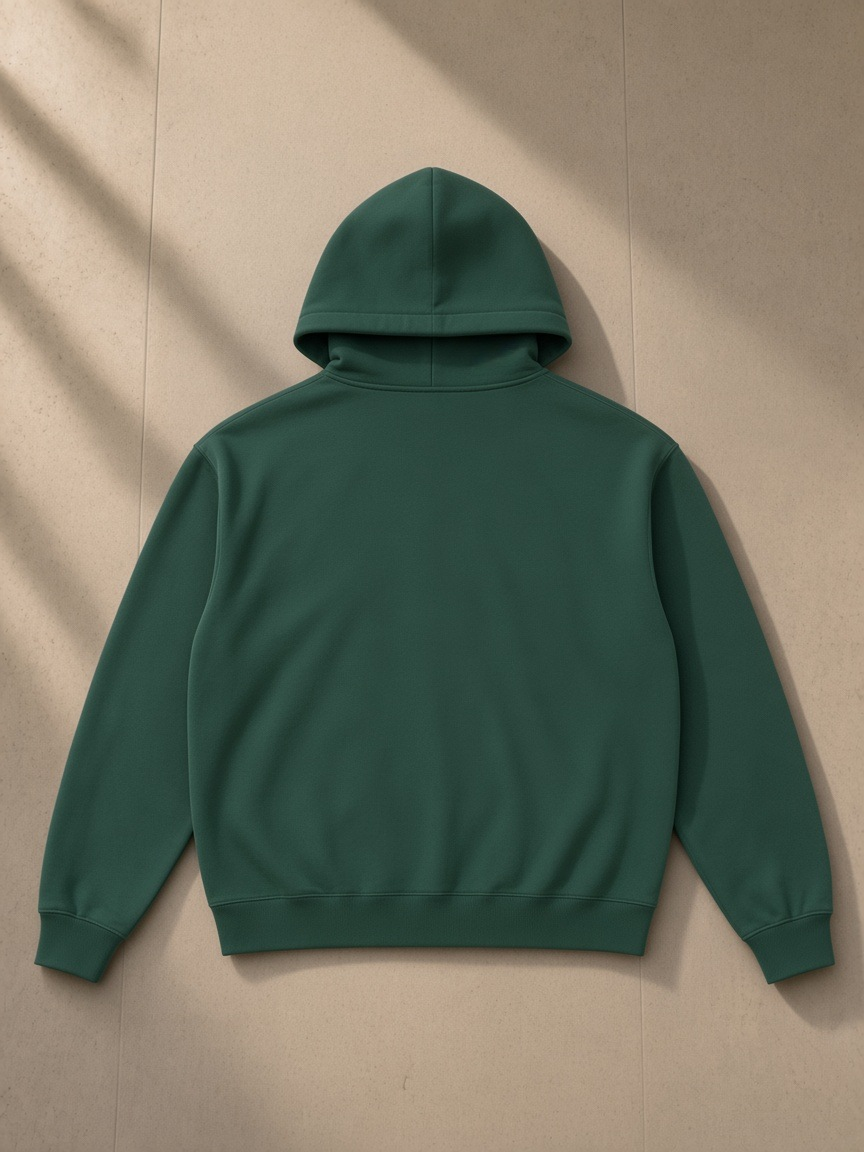 Essential fleece zip-through hoodie in Eden Green, laid flat on pale limestone, back view