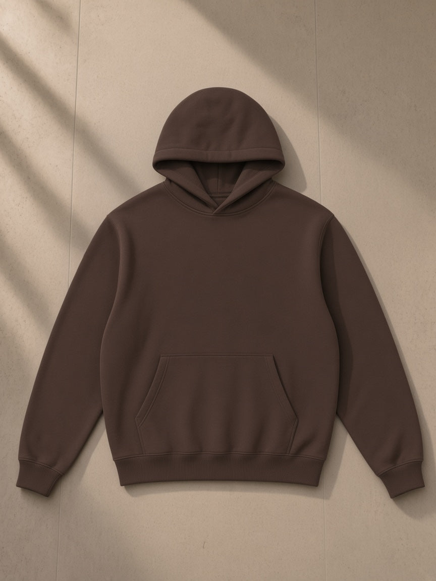 Fleeced high neck hoodie in Brown, laid flat on pale limestone, front view