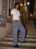 Man in the Frayed Enzyme Washed Fleece Sweatpants in Blue, à deux