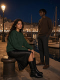 Two people in the Heavyweight Crewneck Sweatshirt in Blackish Green and Coffee on the Old Port quay in Marseille at night