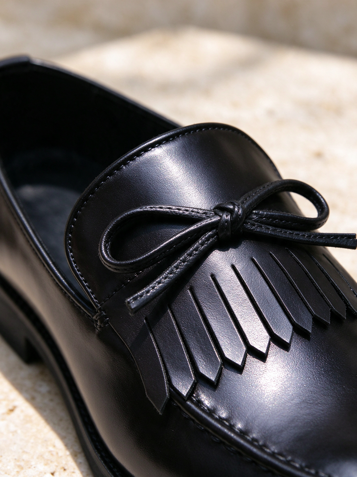 The Ballroom Loafer in black, second macro close-up of the detail