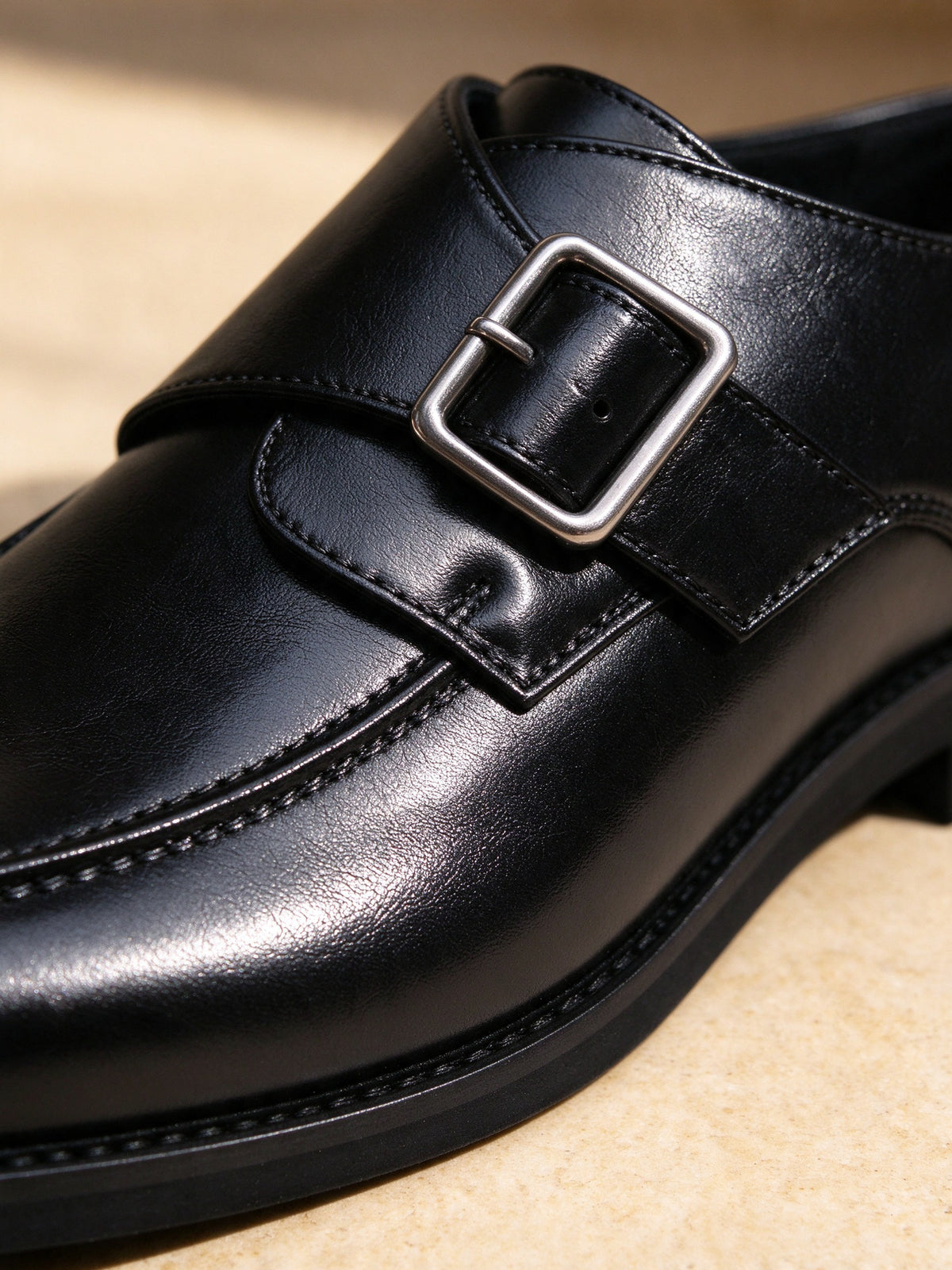 The Cloakroom Monk in black, close-up detail