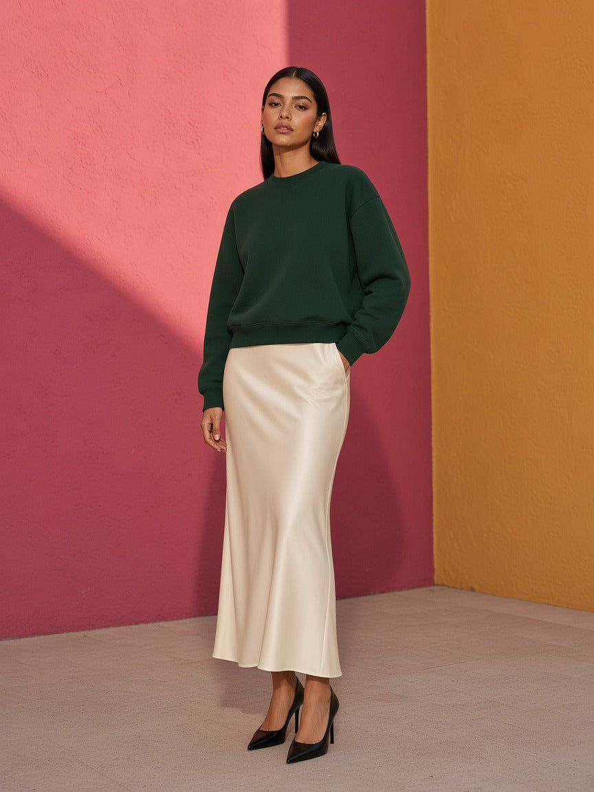 Model wearing the Boxy Fleece Crewneck Sweatshirt in Dark Green, full-length model photo