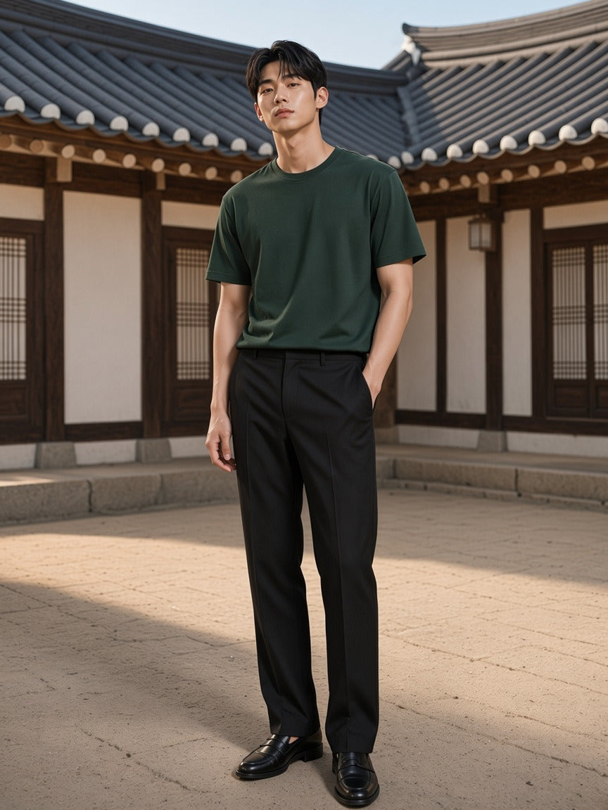 Model wearing the Boxy Ribbed T-Shirt in Dark Green, full-length model photo