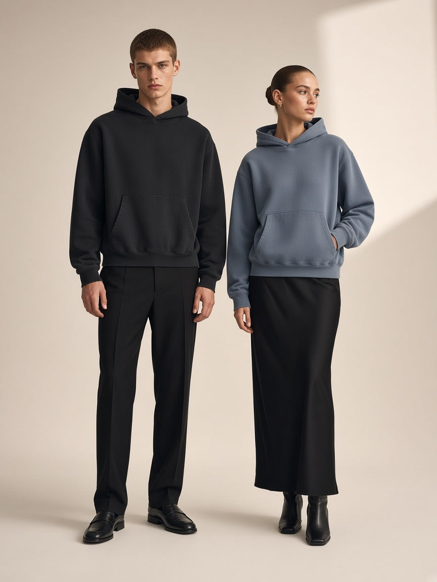 Two people wearing the Boxy Vintage Washed Hoodie in Black and Gray Blue, full-length model photo