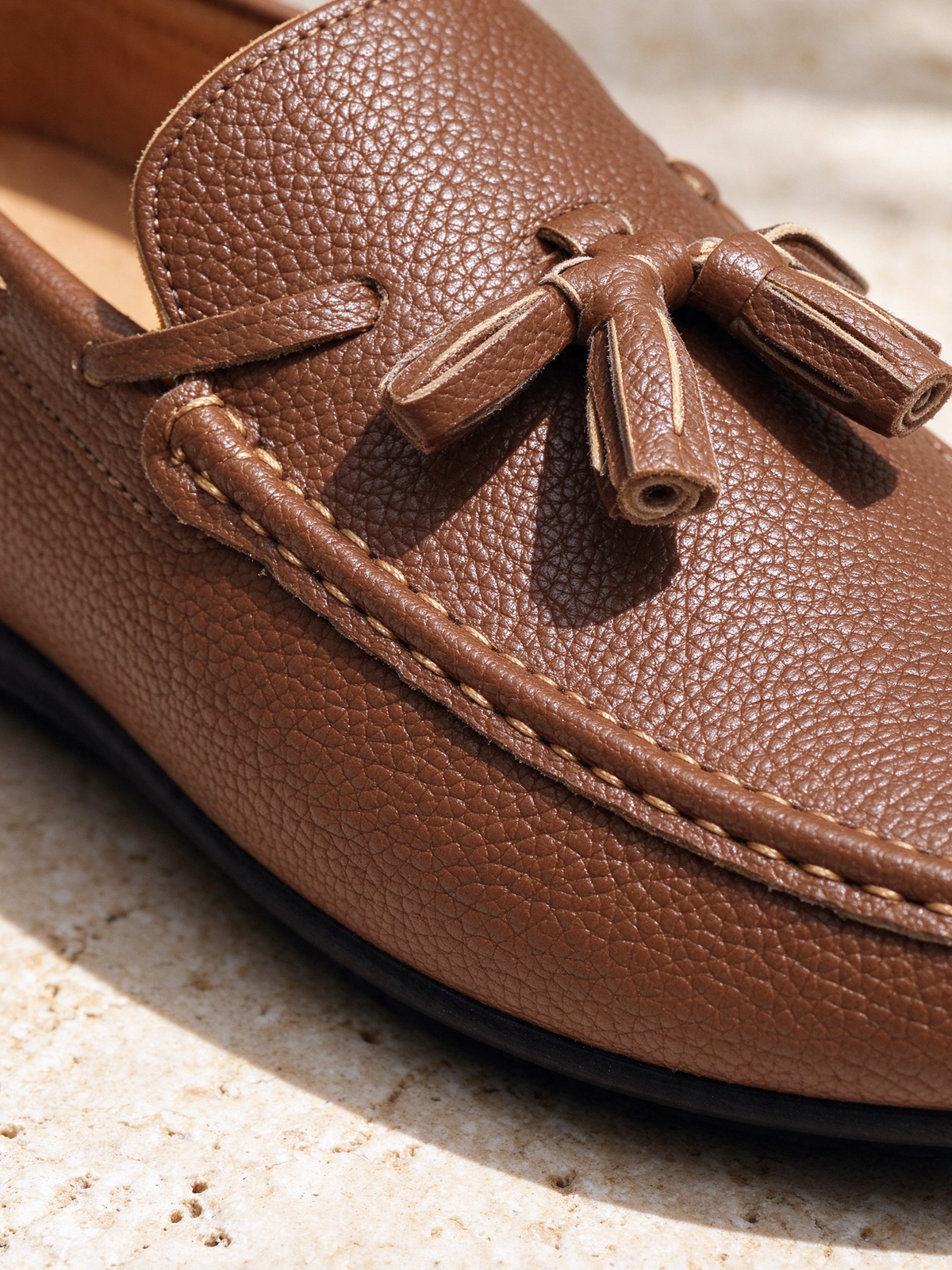 The Coast Road Loafer in brown, macro close-up of the detail