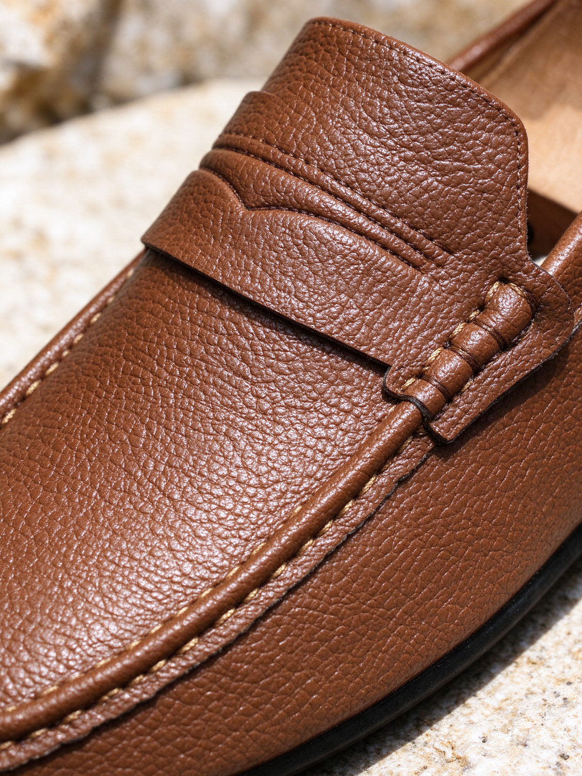The Riviera Loafer in brown, macro close-up of the detail