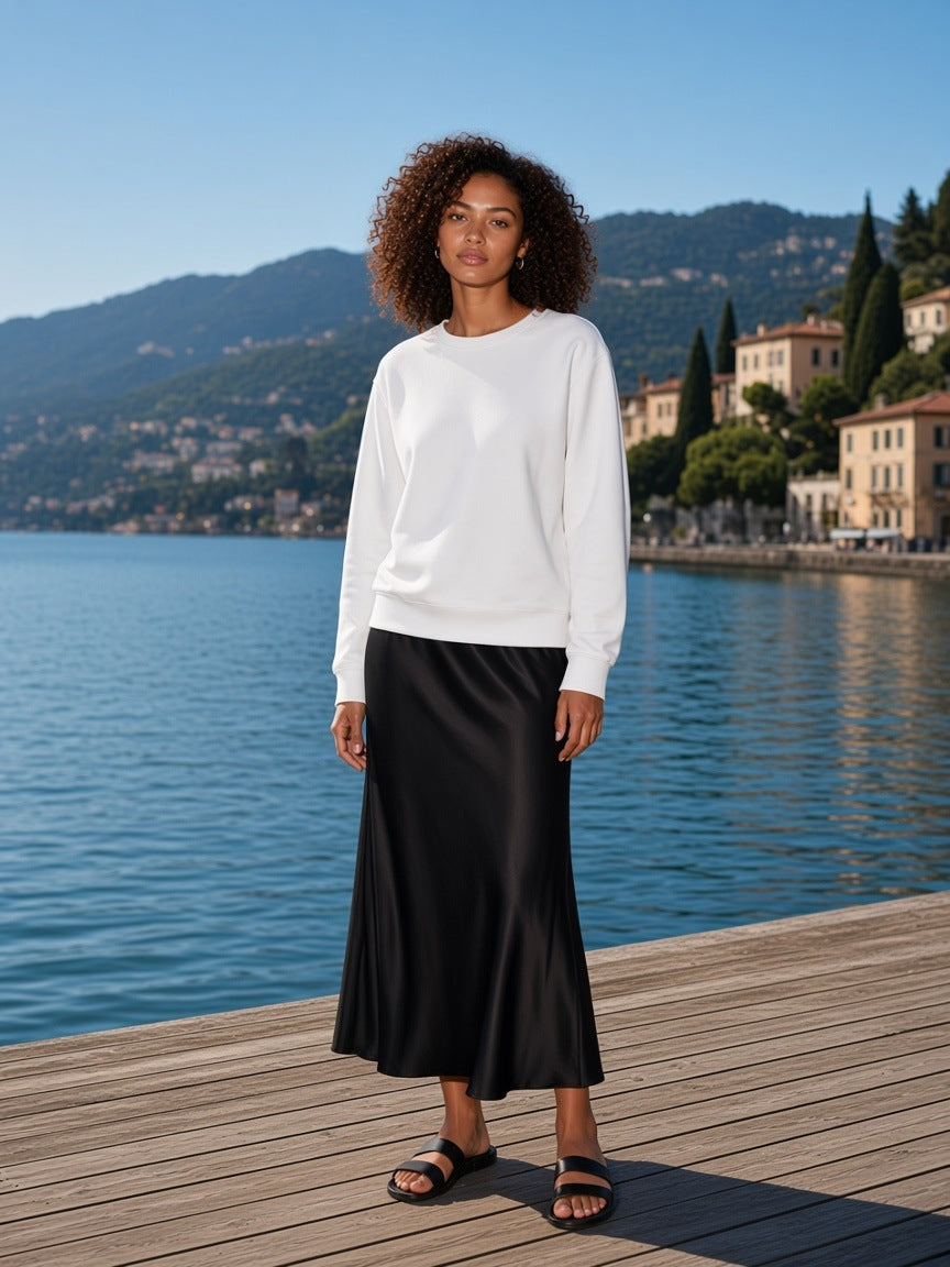 Marcel Afters Classic Cotton Sweatshirt in White, worn by a woman, lake