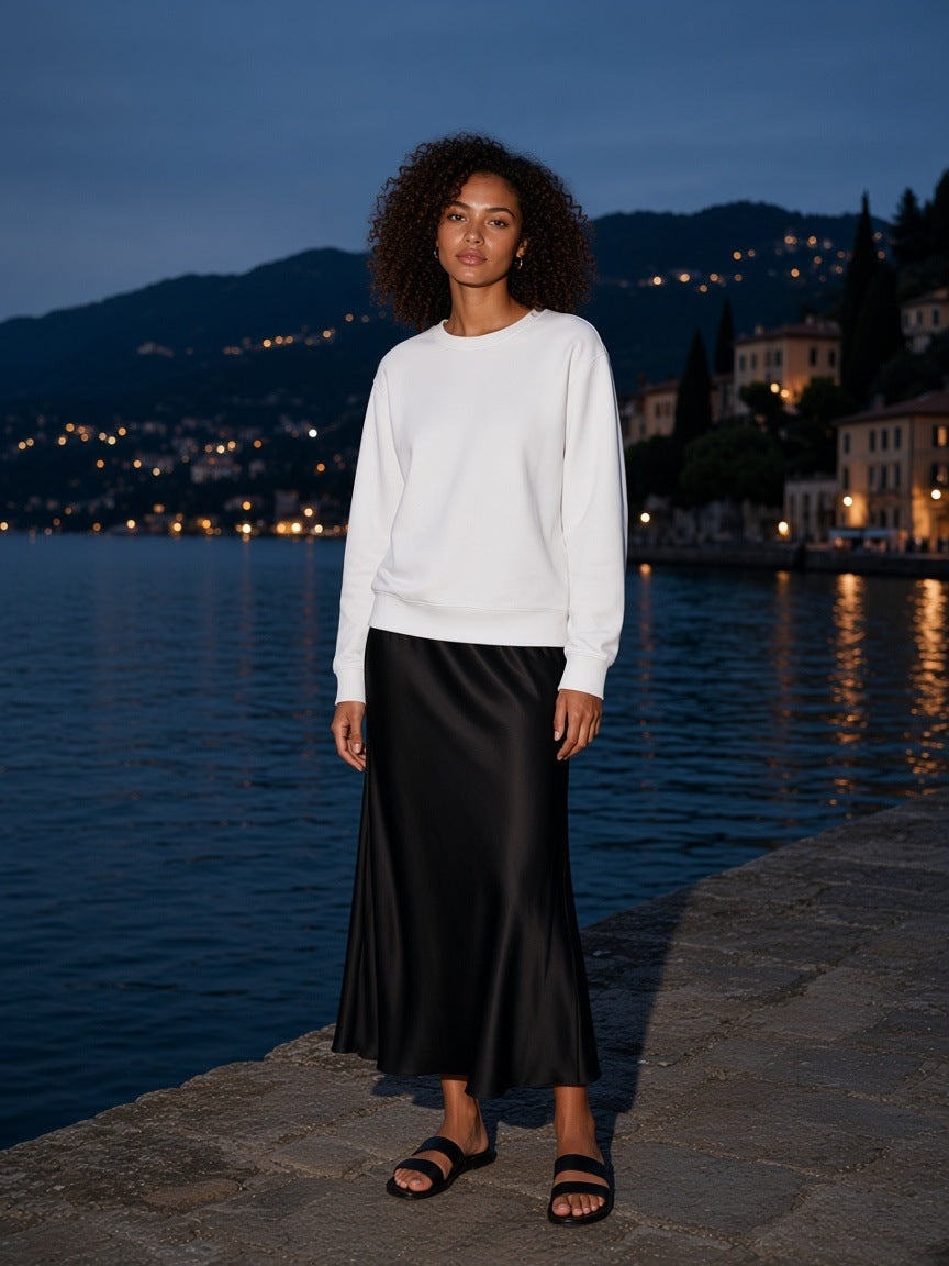 Marcel Afters Classic Cotton Sweatshirt in White, worn by a woman, lake