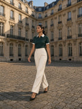 Model wearing the Contrast Collar Raglan Polo Shirt in Dark Green, full-length model photo