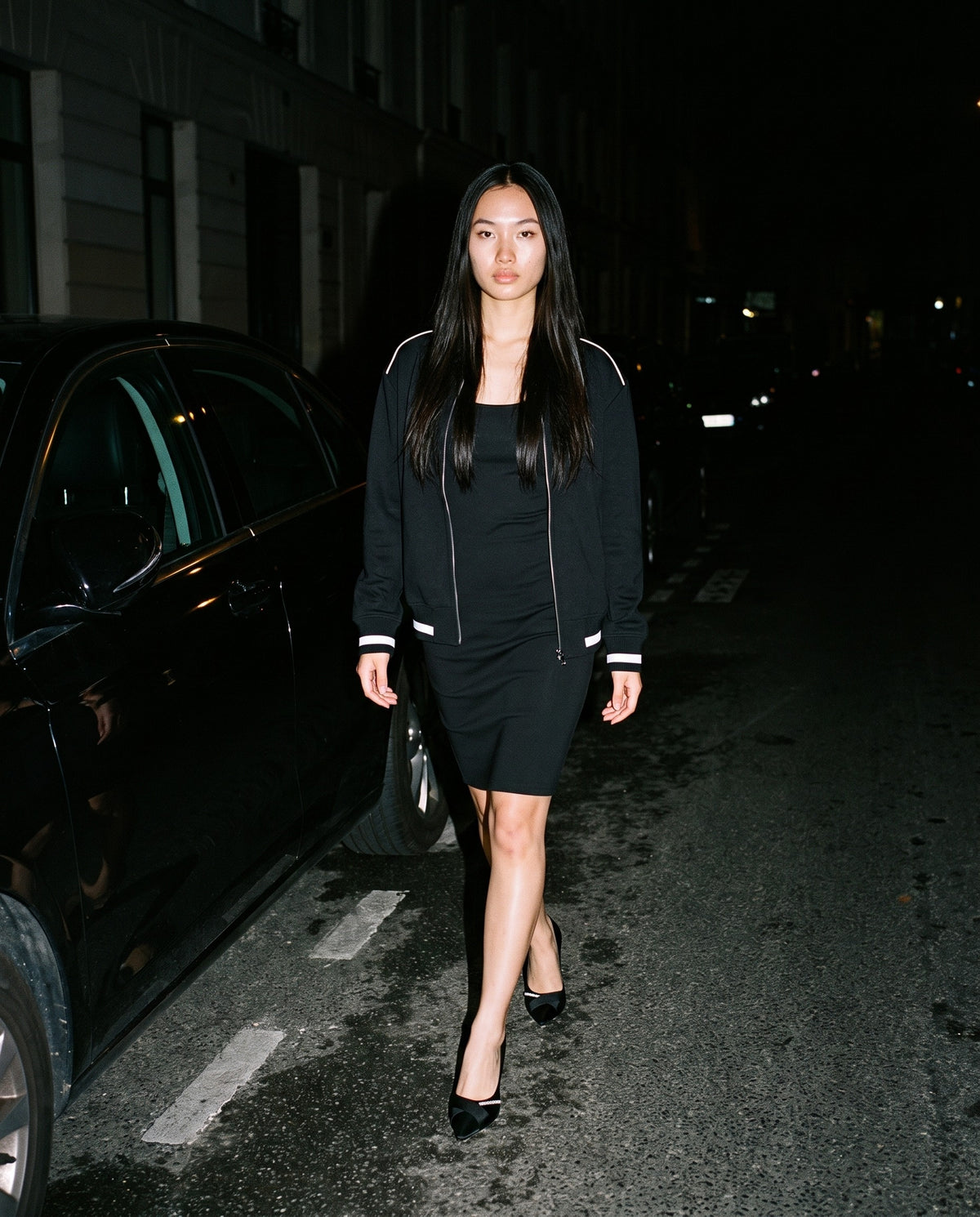 Man wearing the Marcel Afters Contrast Piping Zip Bomber Jacket in Black, full-length editorial photograph
