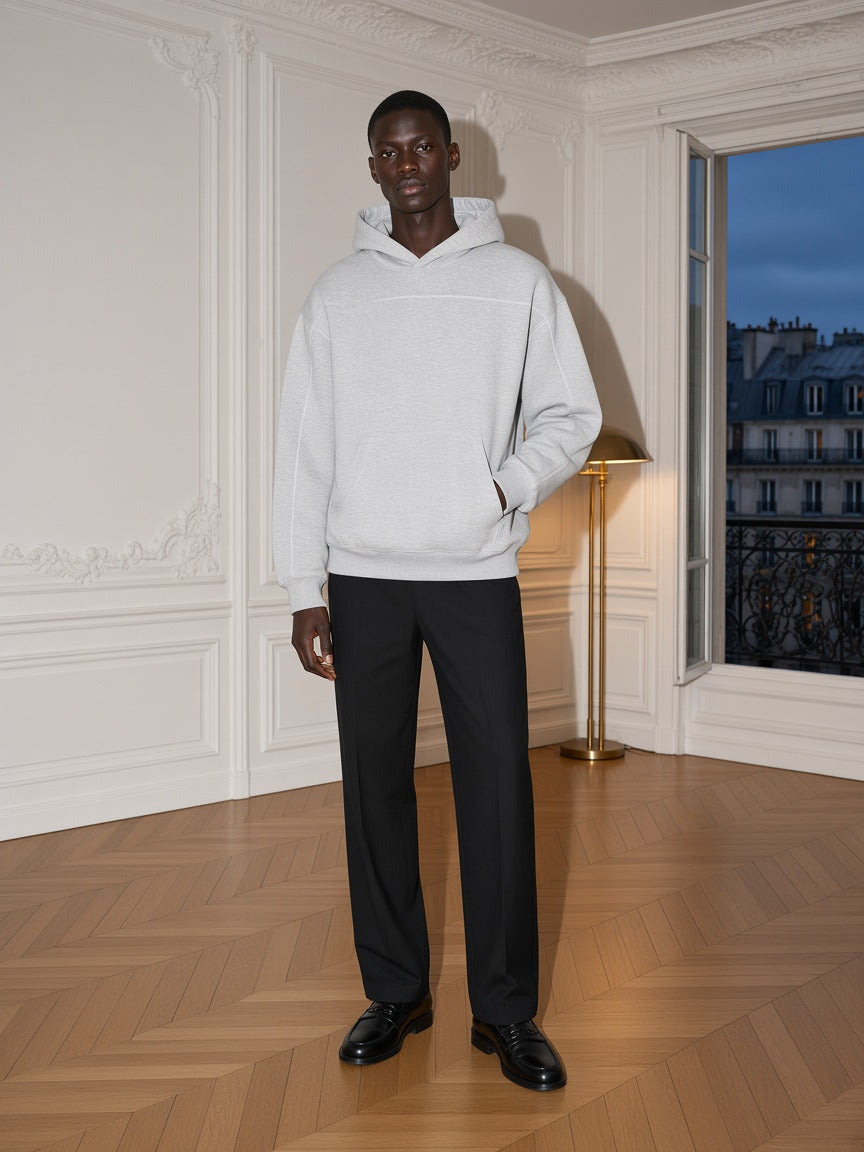 Model wearing the Contrast-Stitched Boxy Fleece Hoodie in Flower Gray, full-length model photo