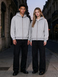 Two people wearing the Contrast-Stitched Boxy Fleece Zip Hoodie in Flower Gray, full-length model photo