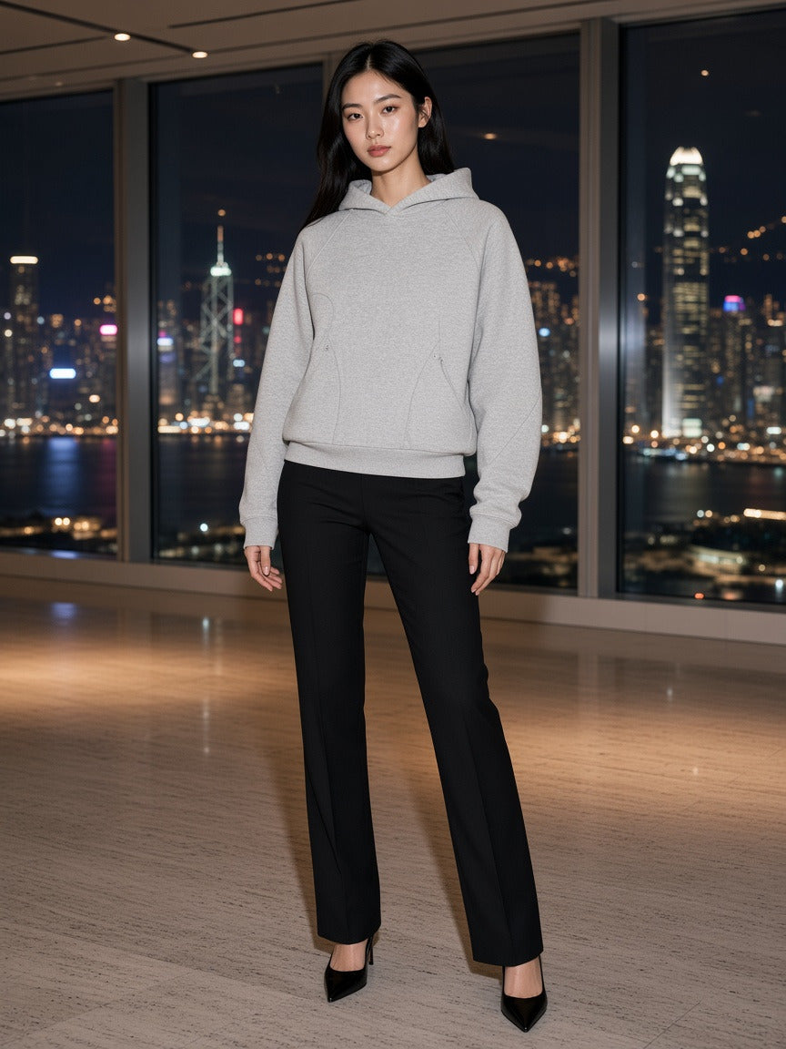 Model wearing the Curved Panel Raglan Hoodie in Flower Gray, full-length model photo