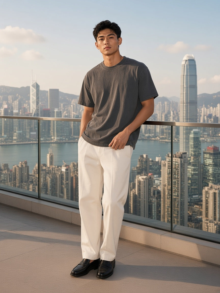 Man wearing the Dirty Washed Loose T-Shirt in Dark Gray, full-length model photo