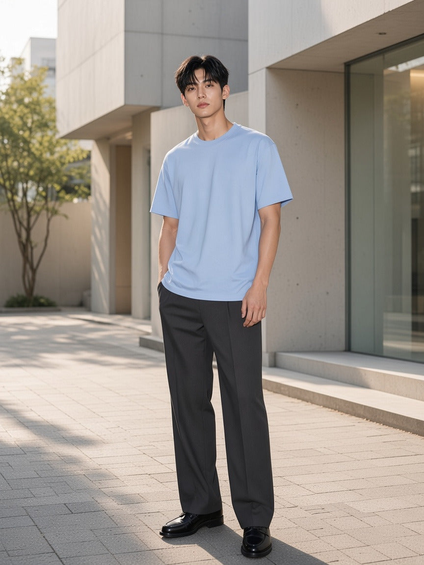 Man wearing the Drop Shoulder Cotton T-Shirt in Blue, full-length model photo