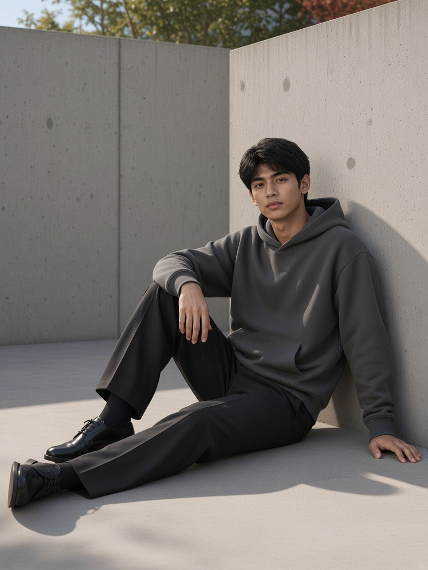 Model wearing the Drop Shoulder Hoodie in Dark Gray, full-length model photo