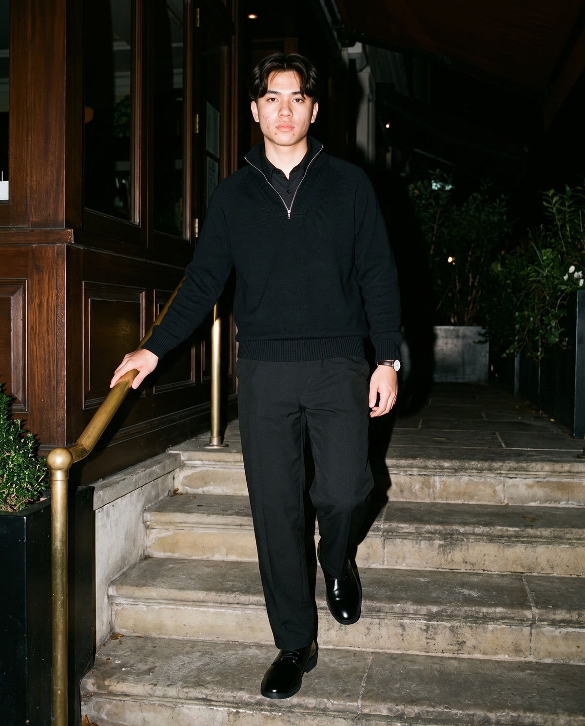 Man wearing the Essential Barrel Dress Pants in Black, full-length model photo