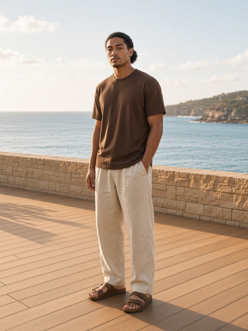 Marcel Afters Essential Cotton Boxy T-Shirt in Coffee, worn by a man, ocean